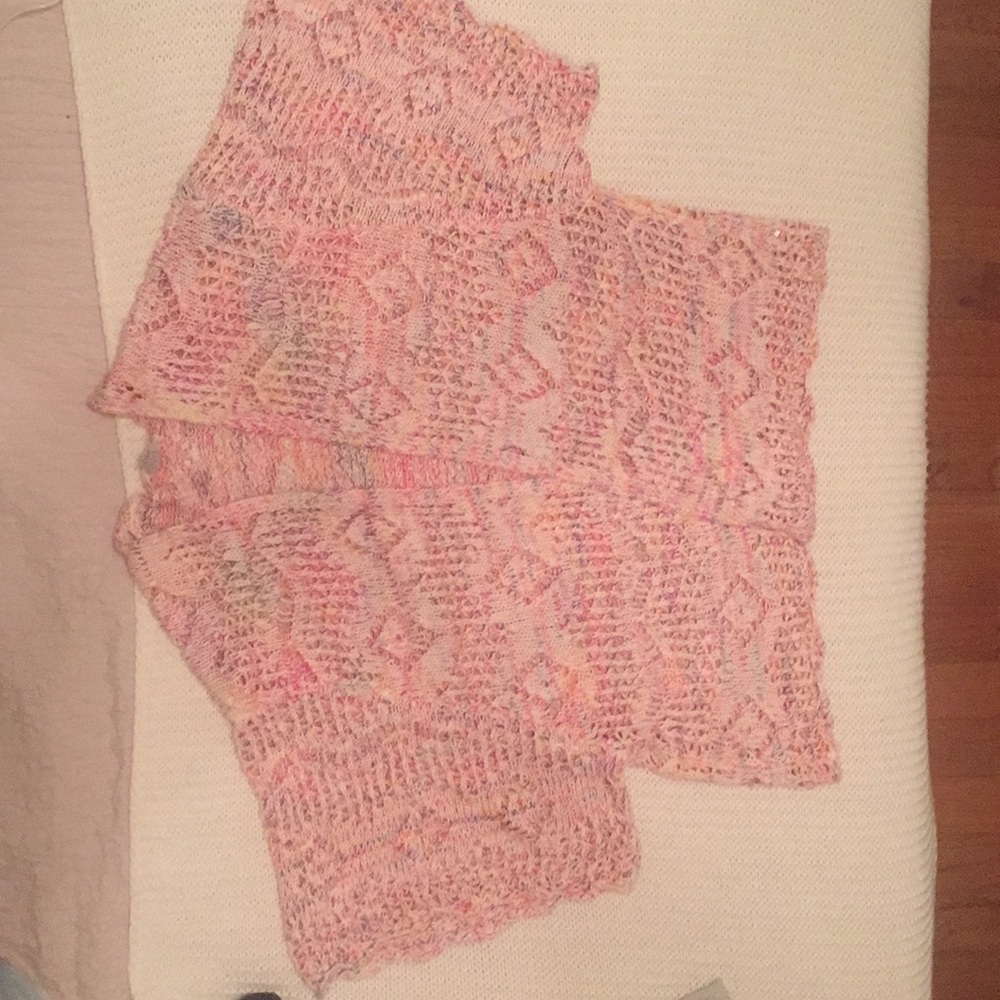 Wonderful knitted sweater with short sleeves.